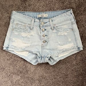 Light Wash Ripped Mid Rise Jean Shorts